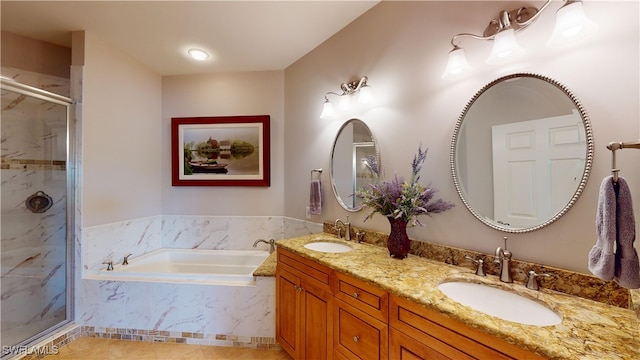 bathroom featuring vanity, independent shower and bath, and tile patterned flooring