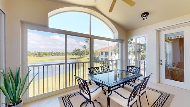 sunroom with lofted ceiling and ceiling fan