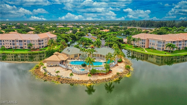 birds eye view of property featuring a water view