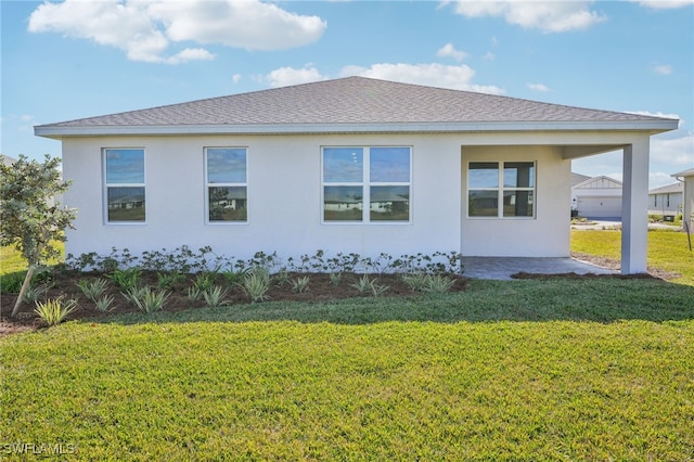 44290 Frontier Dr, Punta Gorda, FL 33982 - view of side of property featuring a lawn