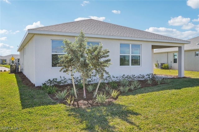 44290 Frontier Dr, Punta Gorda, FL 33982 - view of home's exterior with a yard