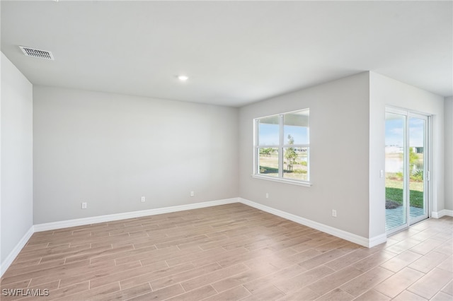 44290 Frontier Dr, Punta Gorda, FL 33982 - empty room featuring light hardwood / wood-style floors