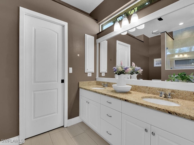 bathroom featuring tile patterned floors and vanity