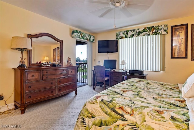 carpeted bedroom featuring ceiling fan and access to outside