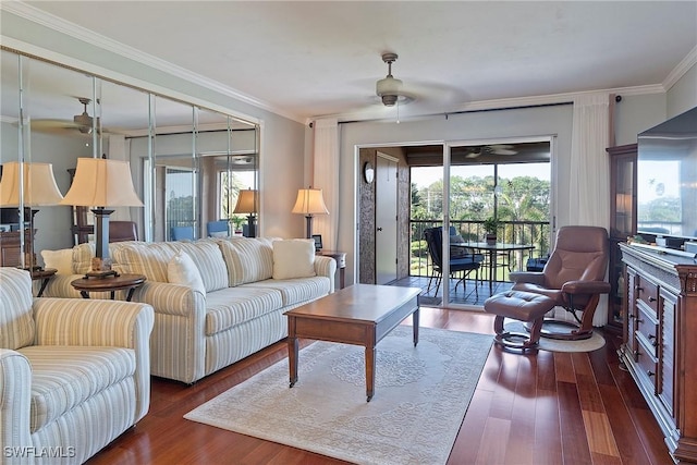 living room featuring ceiling fan, crown molding, and dark hardwood / wood-style flooring