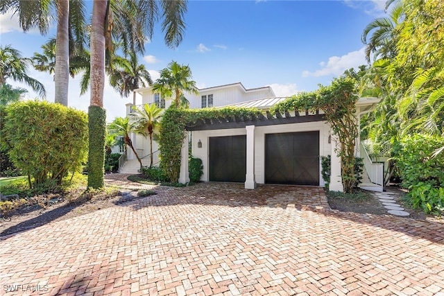 view of front of property with a garage