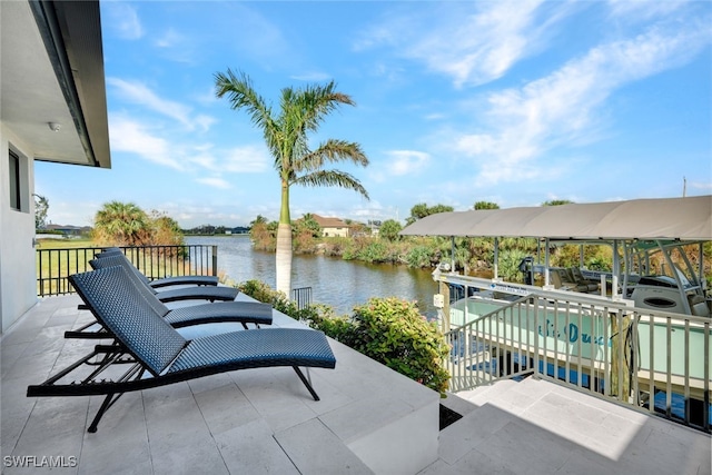 view of patio with a water view