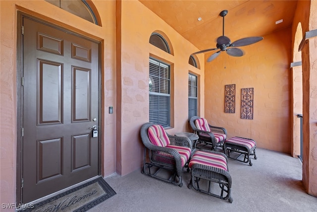 property entrance with ceiling fan