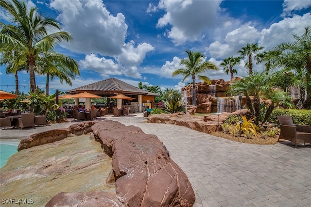 surrounding community featuring a gazebo and a patio area