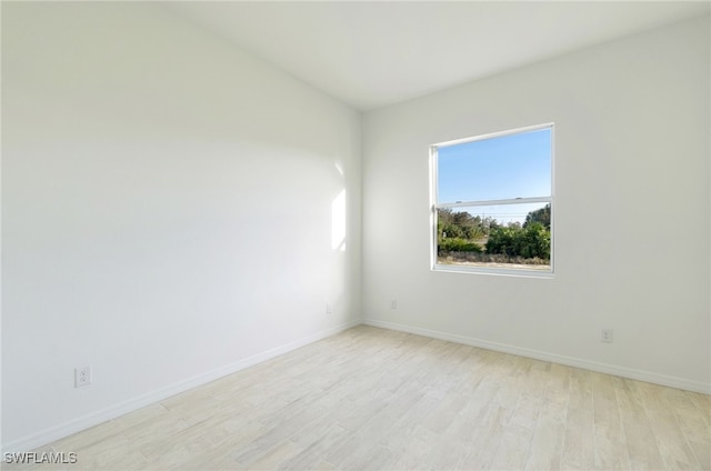 unfurnished room featuring light wood-type flooring