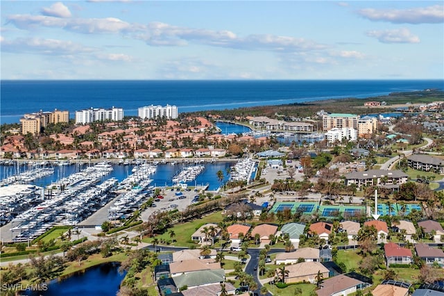 birds eye view of property featuring a water view