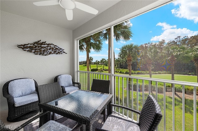 sunroom / solarium with ceiling fan