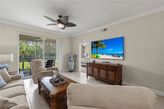 tiled living room featuring ornamental molding and ceiling fan