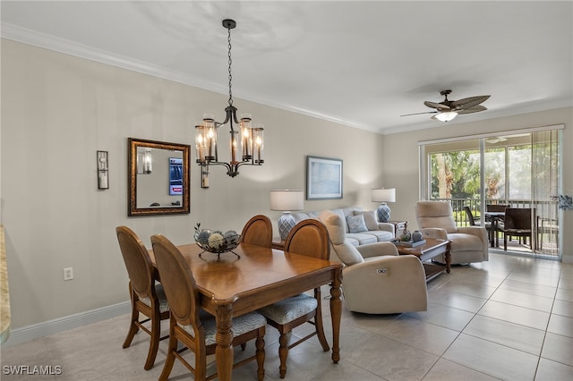 tiled dining area with ornamental molding and ceiling fan with notable chandelier