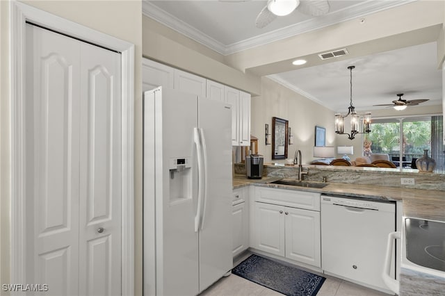 kitchen with kitchen peninsula, white cabinets, light tile patterned flooring, sink, and white appliances