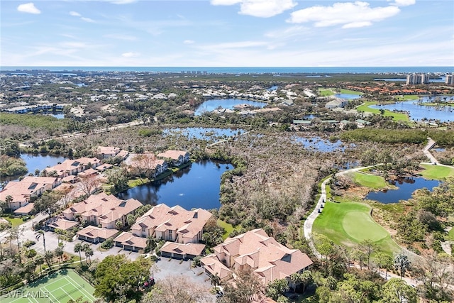 drone / aerial view with a water view