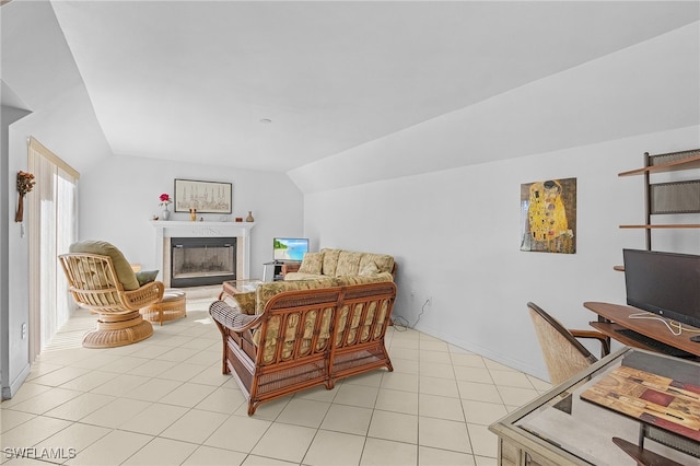 living room with light tile patterned floors and lofted ceiling