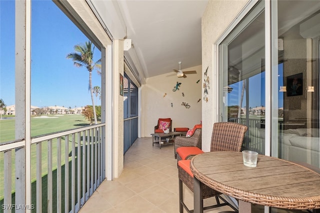 balcony featuring ceiling fan