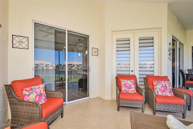 interior space with french doors and light tile patterned floors