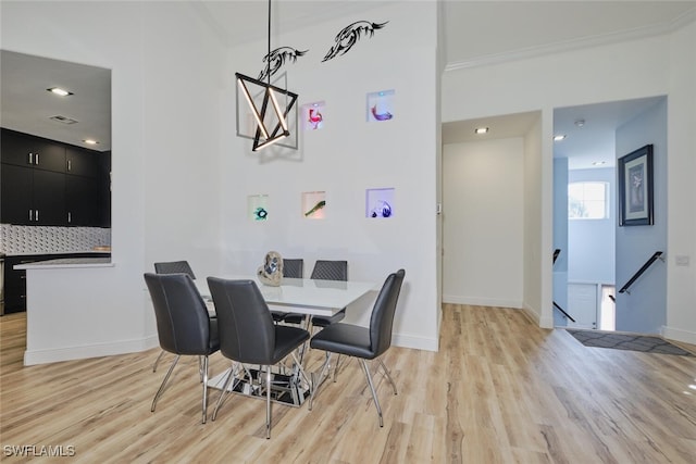 dining space featuring light wood-type flooring