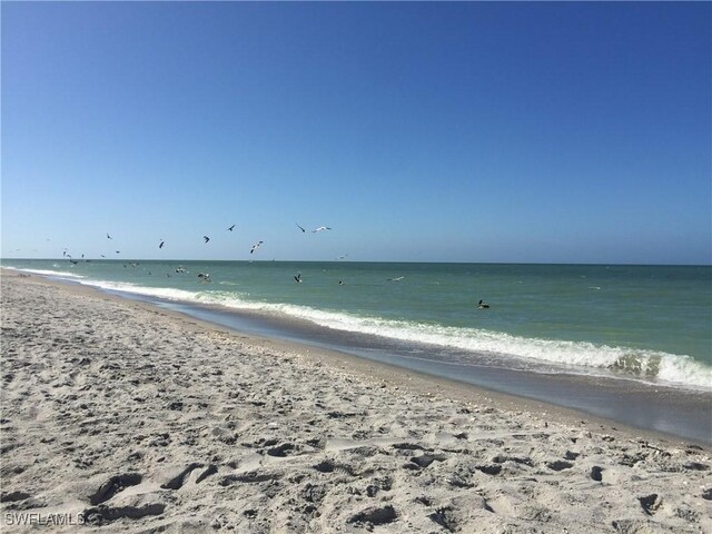 838-840 Rabbit Rd, Sanibel, FL 33957 - property view of water featuring a view of the beach