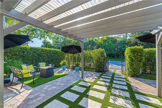 view of patio featuring a pergola