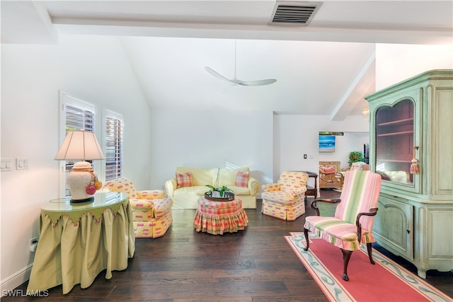 sitting room featuring vaulted ceiling and dark hardwood / wood-style floors