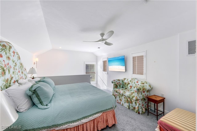 bedroom featuring carpet, vaulted ceiling, and ceiling fan