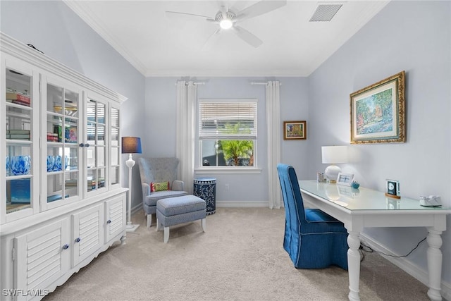 carpeted office with crown molding and ceiling fan