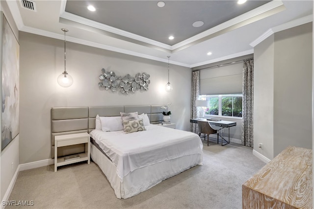 bedroom with a tray ceiling, crown molding, and light colored carpet