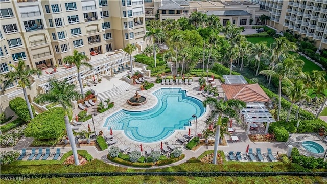 view of swimming pool with a patio