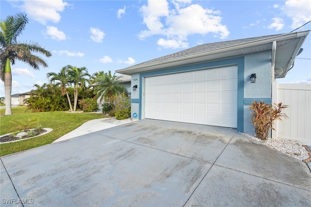 garage featuring a yard