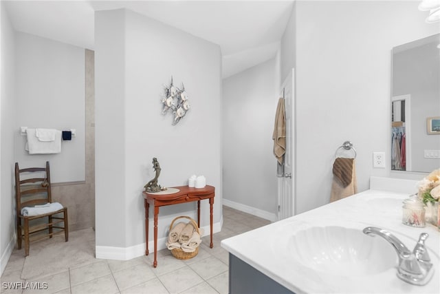 bathroom with vanity and tile patterned flooring