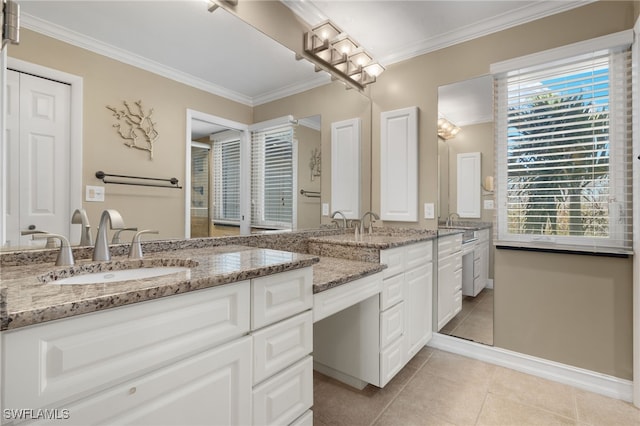 bathroom with vanity, ornamental molding, and tile patterned flooring