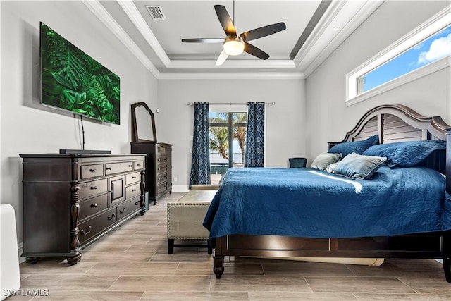 bedroom with crown molding, access to outside, a raised ceiling, and ceiling fan