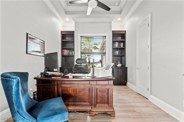 office area featuring ornamental molding, ceiling fan, and a tray ceiling