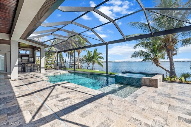 view of swimming pool featuring a lanai, a water view, a patio area, a bar, and an in ground hot tub