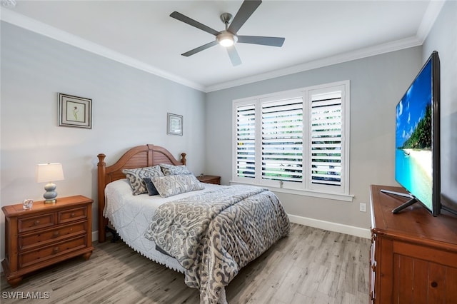 bedroom with ornamental molding, light wood-type flooring, and ceiling fan