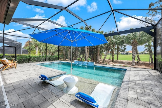 view of swimming pool with a patio area, a lanai, and pool water feature