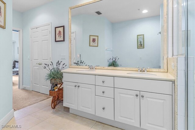 bathroom featuring vanity and tile patterned floors