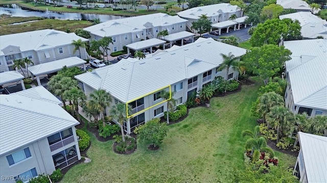 drone / aerial view with a water view