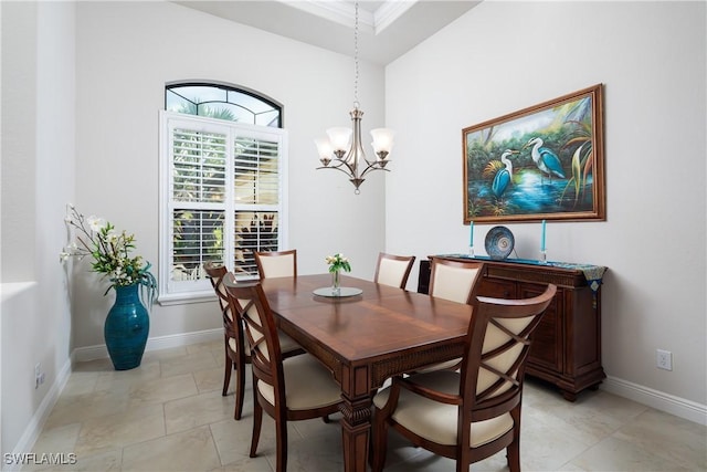 23083 Sanabria Loop, Bonita Springs, FL 34135 - dining area featuring baseboards and a notable chandelier