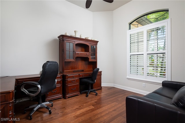 office with dark hardwood / wood-style floors and ceiling fan