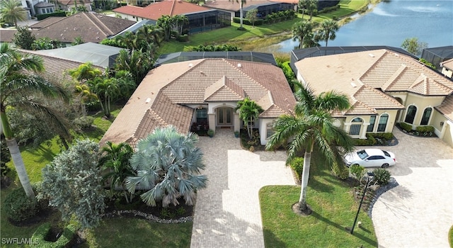 birds eye view of property featuring a water view