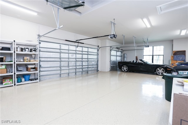 garage featuring a garage door opener