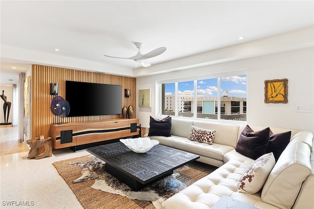 living room featuring ceiling fan