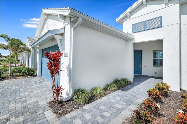 exterior space with a garage