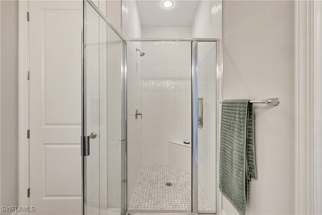 bathroom with walk in shower