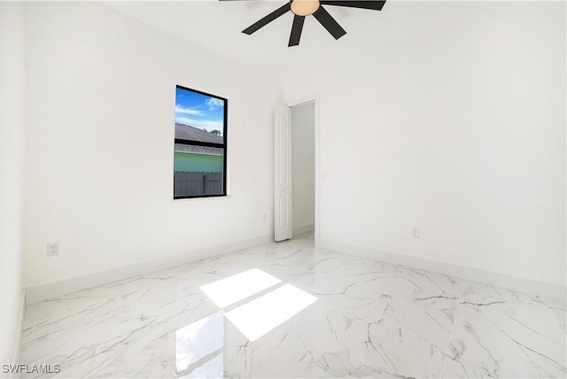 empty room featuring ceiling fan