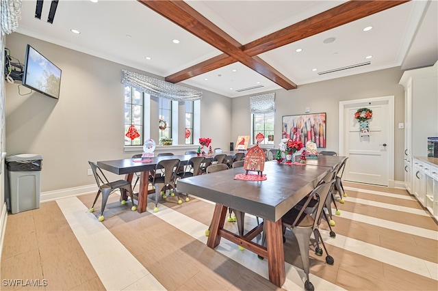 dining space featuring light hardwood / wood-style floors, beamed ceiling, an inviting chandelier, and coffered ceiling